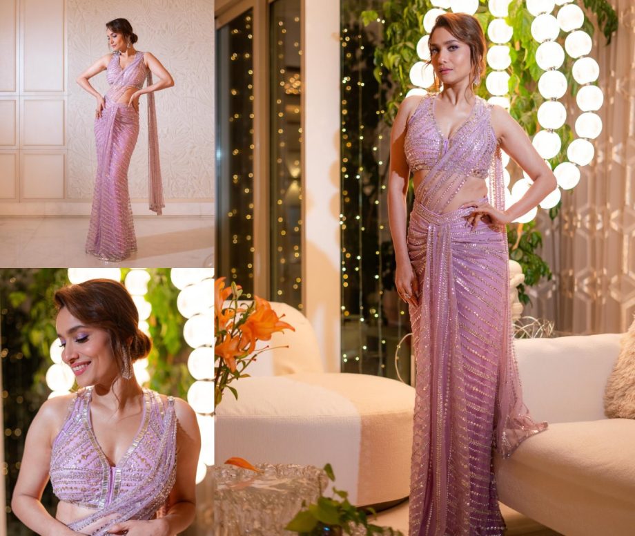 Ankita’s purple-pink saree has studded and intricate work all over the drape saree, which has a sheer tucked end piece.