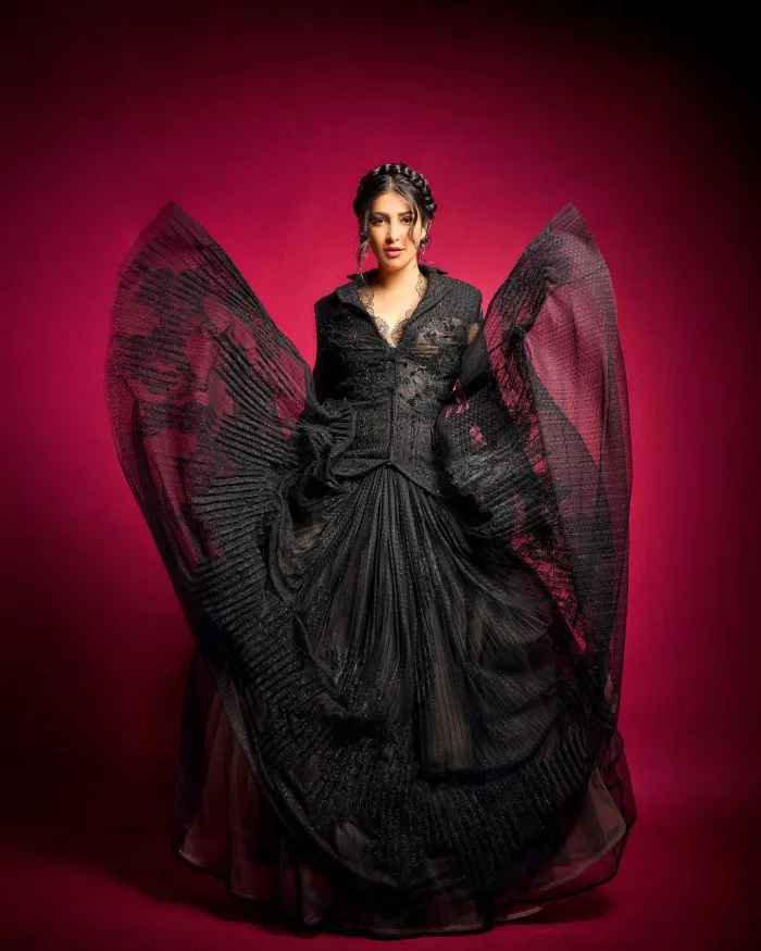 Shruti Haasan made a bold fashion statement with her choice of an exquisite black gown, showcasing her unique style and confidence.